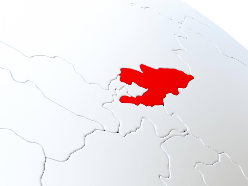 Die Silhouette eines Landes umgeben von anderen Ländern